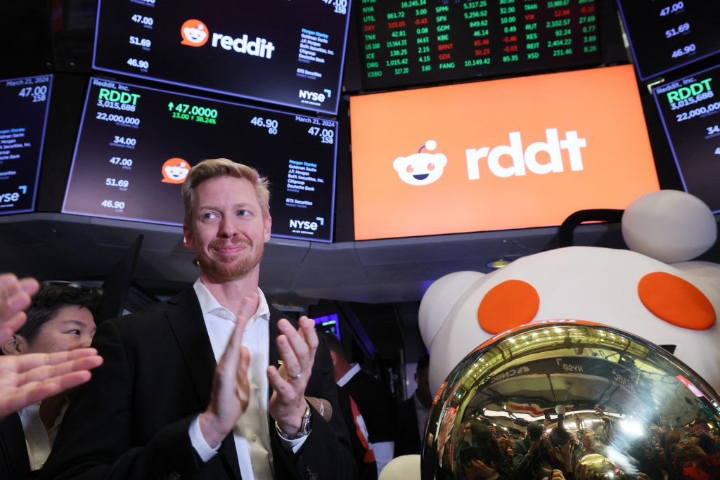 Reddit's ipo stock finishes its inaugural trading day with a nearly 48% increase in value